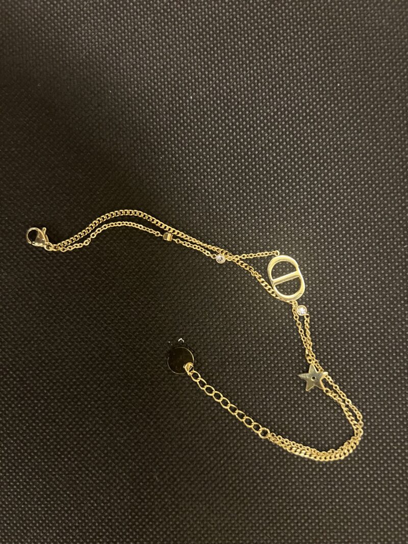 Bracelet Double CD Luxe et Étoile en Acier Inoxydable – Élégance Moderne et Résistance Exceptionnelle